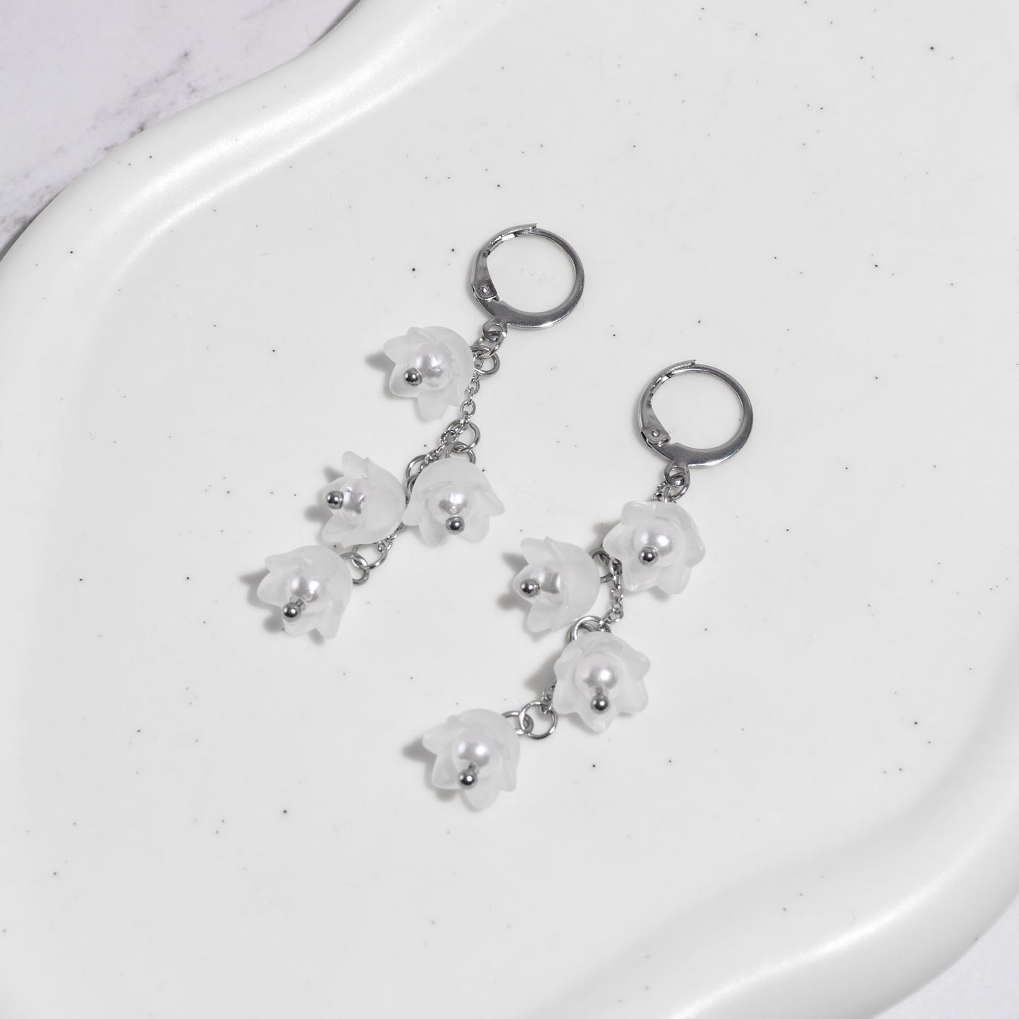 "Falling bloom" boucles d'oreilles dormeuses acier inoxydable