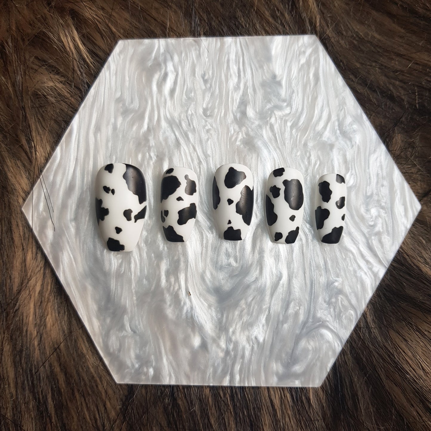 Signature: Cow-moo-flage
