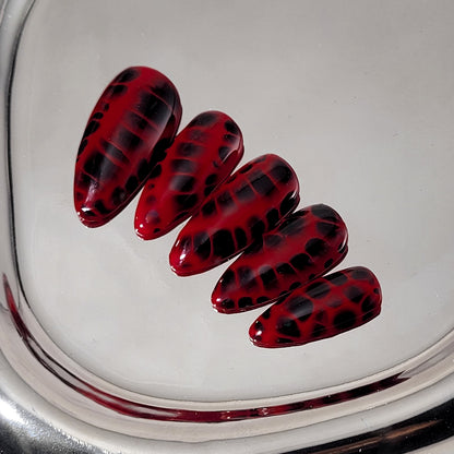 Signature:  Crimson reptilia