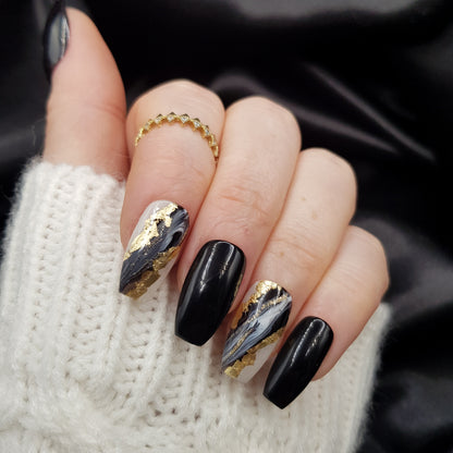 Signature:  Black swirl